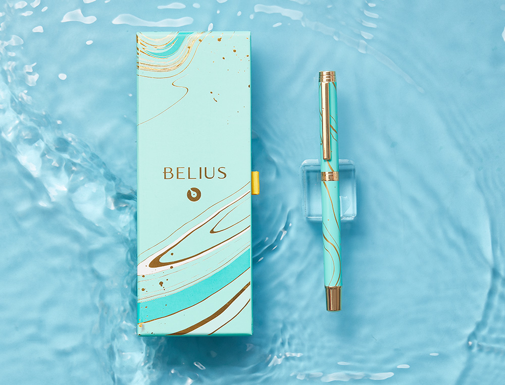 ROLLER BELIUS AQUA ALUMINIO DESENHO TURQUESA E DOURADO TINTA PRETA CAIXA DESIGN
